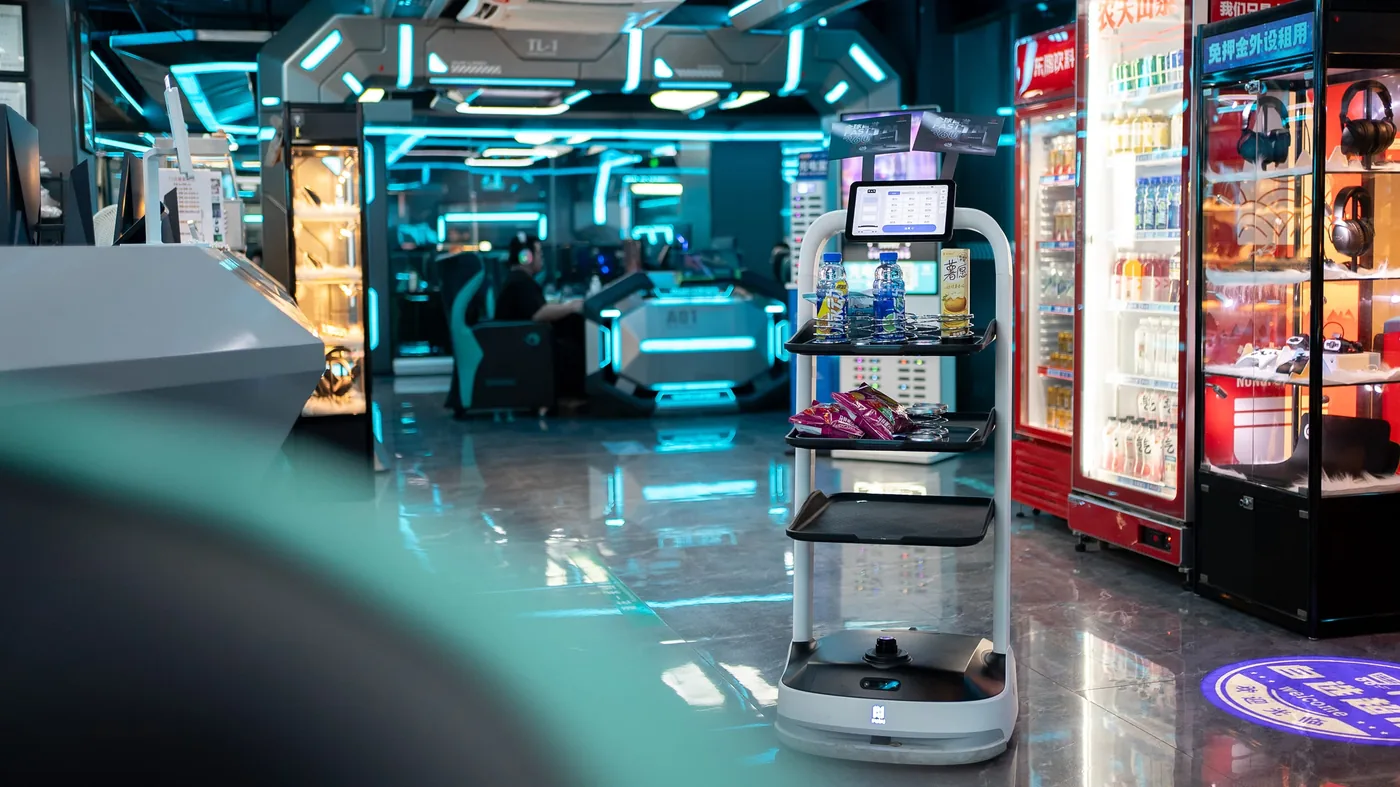 A greeter robot working a public venue concourse