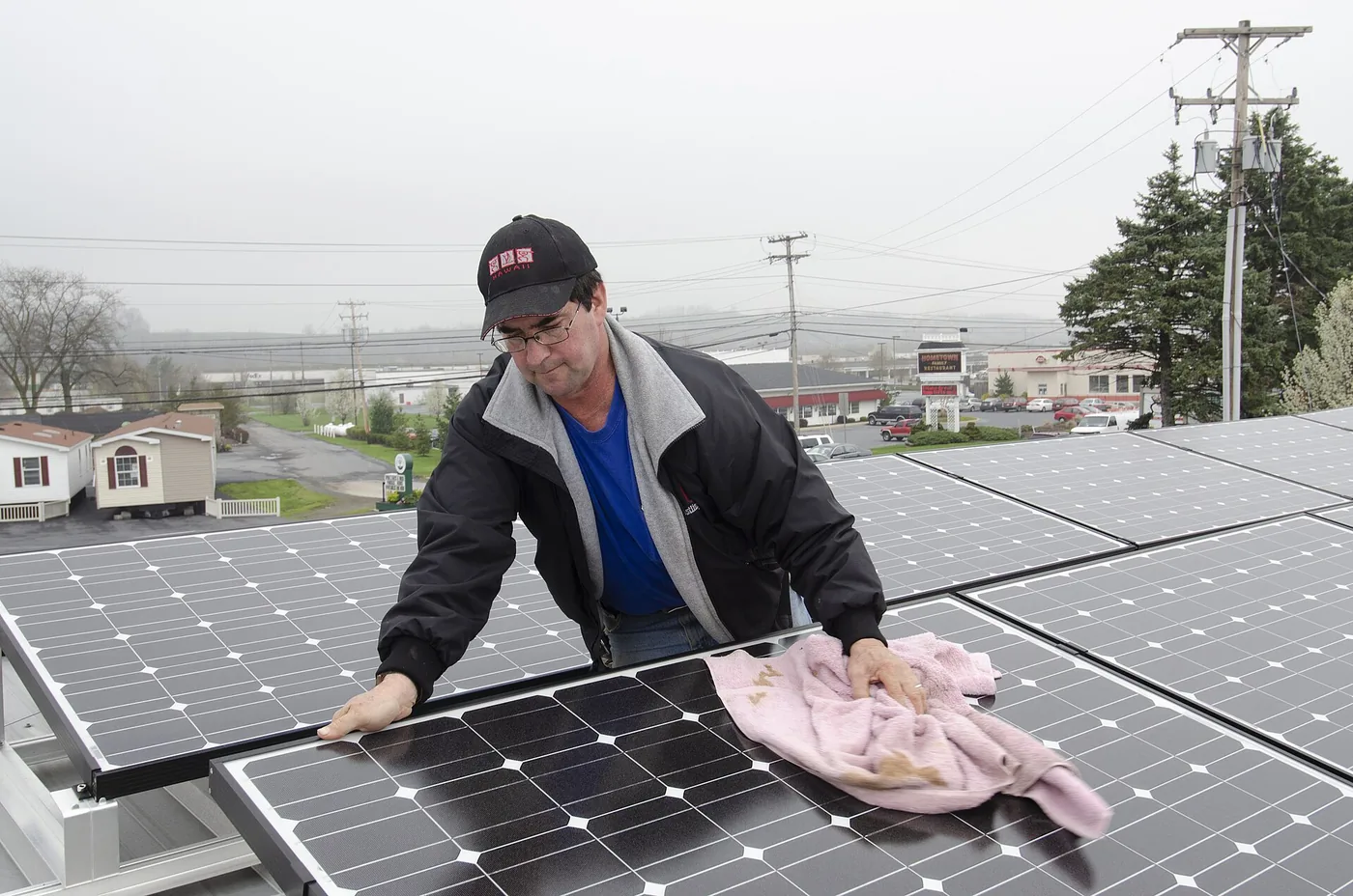 A solar panel array being cleaned