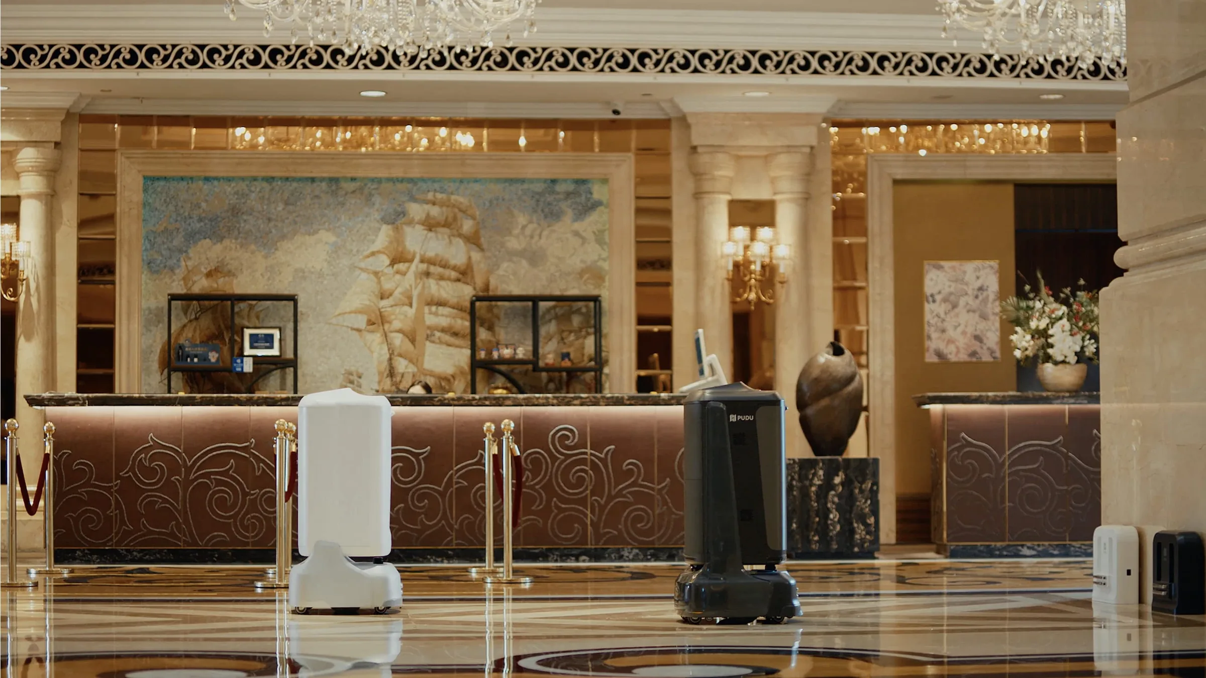 A hotel lobby served by robots